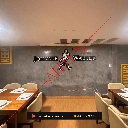 Logotipo de metal con pared luminosa